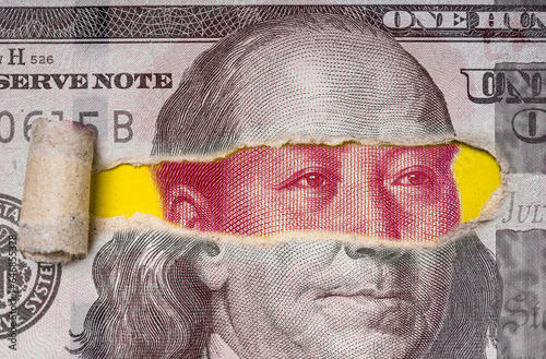 Photography Mao Tse Tung face of Yuan banknote inside Benjamin Franklin of USD dollar banknote for China economy military conflict and technology disrupt to United States of America concept