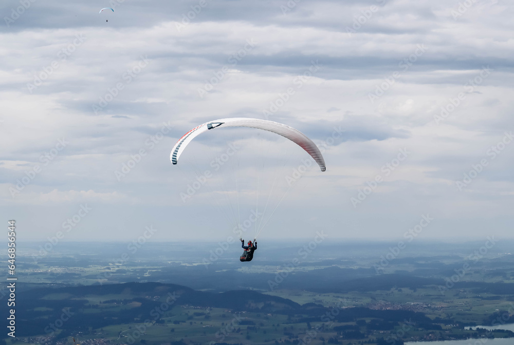 Schwangau, Germany - August 12, 2023: Paragliding over Neuschwanstein Castle in Germany Schwangau, Germany - August 12, 2023: Paragliding over Neuschwanstein Castle in Germany