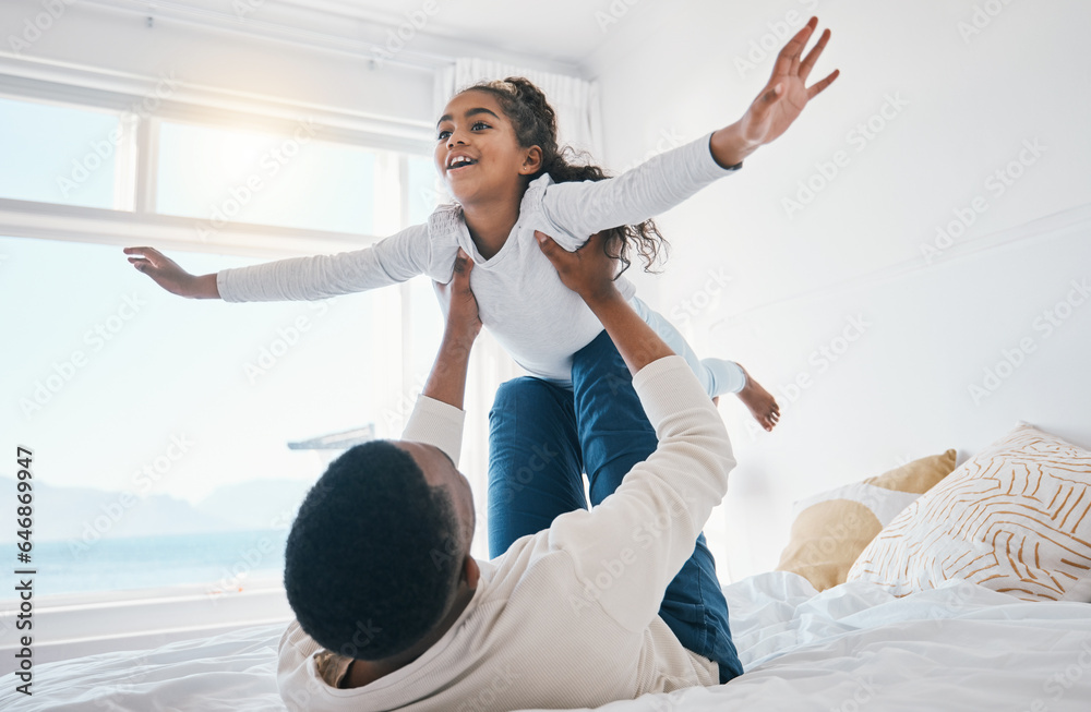 Airplane, love and father with girl child on a bed for bond, trust or support in their home together. Flying, family time and parent with kid in a bedroom for games, play or fun with weekend freedom