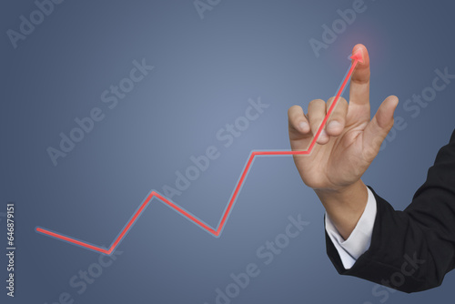 Hand touching graph of financial indicator, analysis accounting market economy, business strategy concept. businesswoman with graph symbols coming from hand.