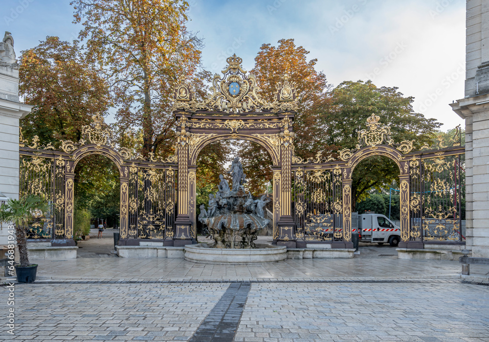 Fototapeta premium Nancy, France - 09 02 2023: Unesco World Heritage. View of the Amphitrite Fountain - in Stanislas Square at sunrise.
