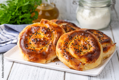 Traditional delicious Turkish phyllo stuffed with spinach, cheese (Turkish name; Gul borek or gul boregi) Rose shaped pastry.