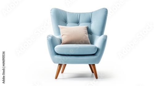 Blue wingback armchair with pillow and wooden feet, isolated on white background.