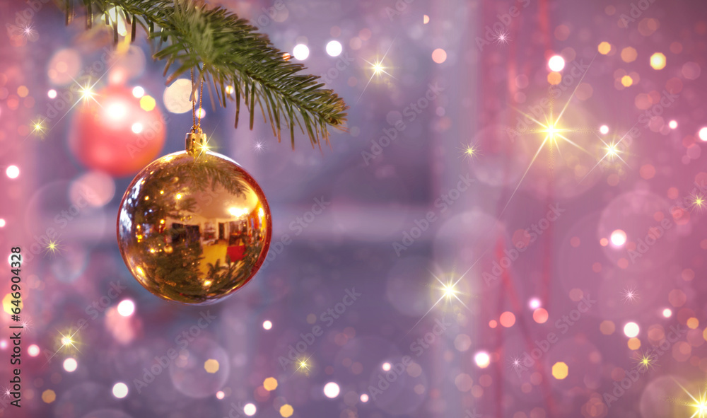 Fototapeta premium Christmas ball on fir tree branch isolated on blur background.