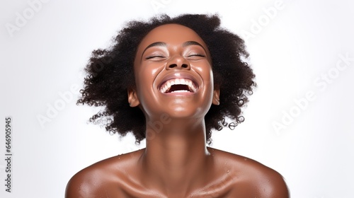 Makeup for a black woman using beauty foundation, natural face cosmetics, and spa skincare shine. Studio lighting, a face shadow, or an African with shining skin