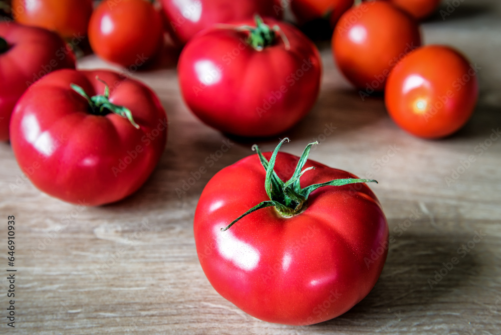 Ripe juicy tomato on the table