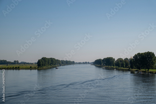 The river Maas (Meuse) between Gelderland and North Brabant on a sunny day