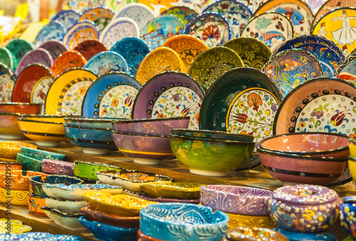 Vibrant Turkish ceramics disks and bowls for sale at the local bazaar.