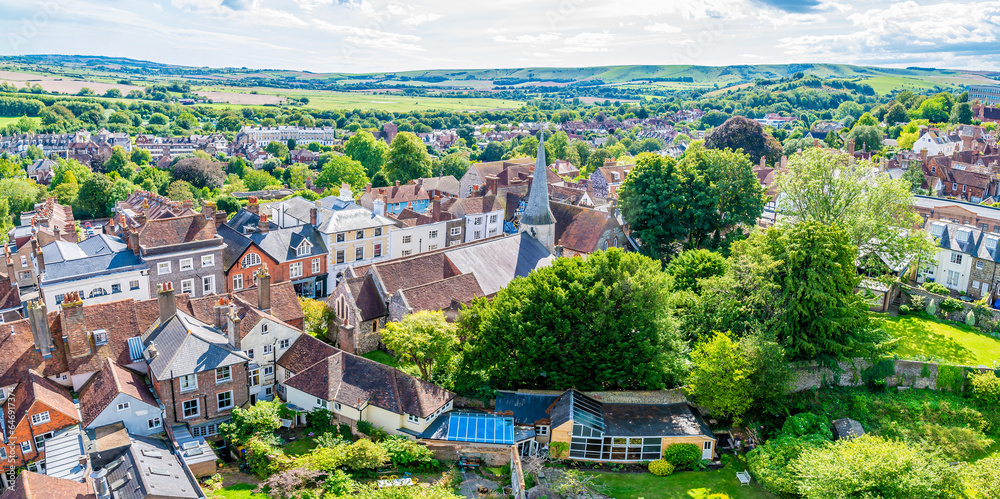 Fototapeta premium A panorama view south along the High Street from the ramparts of the castle keep in Lewes, Sussex, UK in summertime