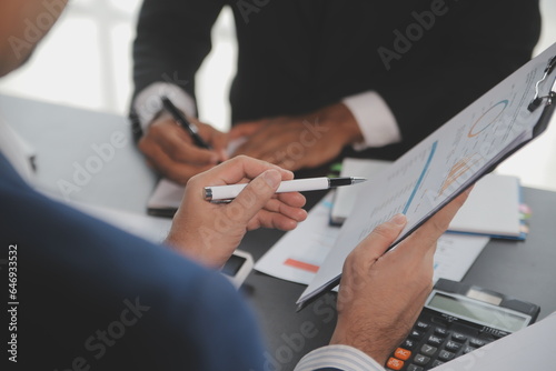 Team of business people working together in the meeting room office, teamwork background charts and graphs banner, double exposure successful teamwork,business planning concept.