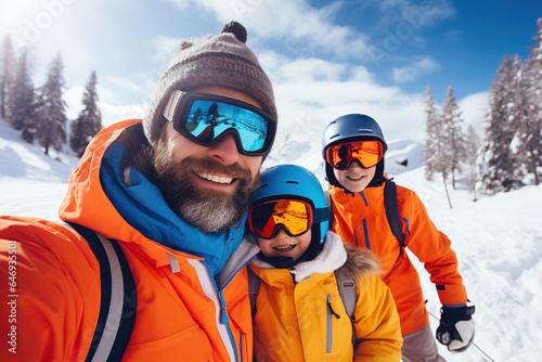 Happy father with his children skiing in the Alps.