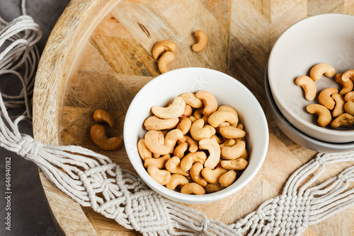 Roasted cashew nuts in bowl.