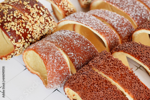 Close up of 'Kurtoskalacs', a spit cake from Hungary and Romania made from sweet yeast dough strips baked wrapped around cone–shaped baking spit photo