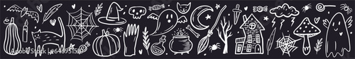 Vector set of Halloween symbols drawn by hand in the style of a doodle
