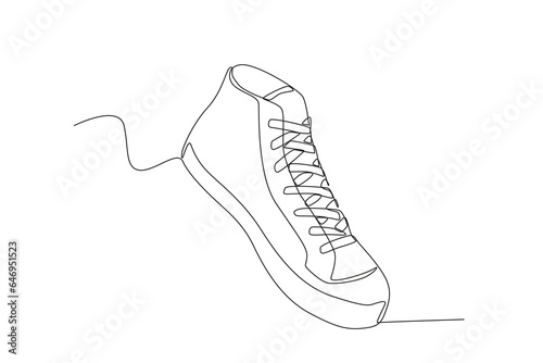 A stylish men's sneaker. Footwear one-line drawing