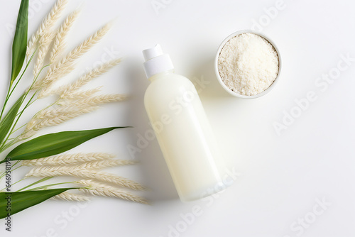 Cosmetic skin care product body lotion, face cream or mask on background of rice or oatmeal