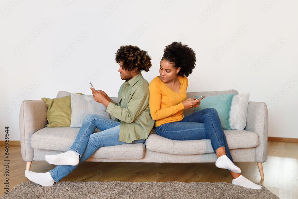 Nosy African American Wife Peeking At Her Husband Phone Indoor Nosy African American Wife Peeking At Her Husband Phone Indoor