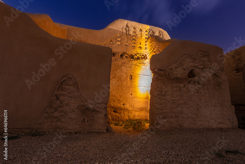 Diriyah old town walls illuminated at night, Riyadh, Saudi Arabia photo