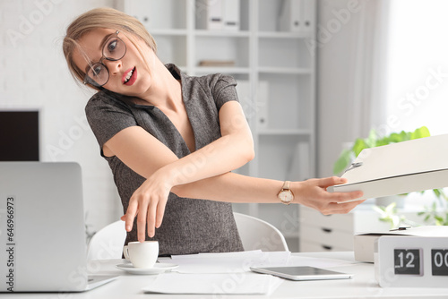 Young businesswoman working...