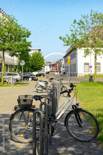 Modern bicycle parked on ci...