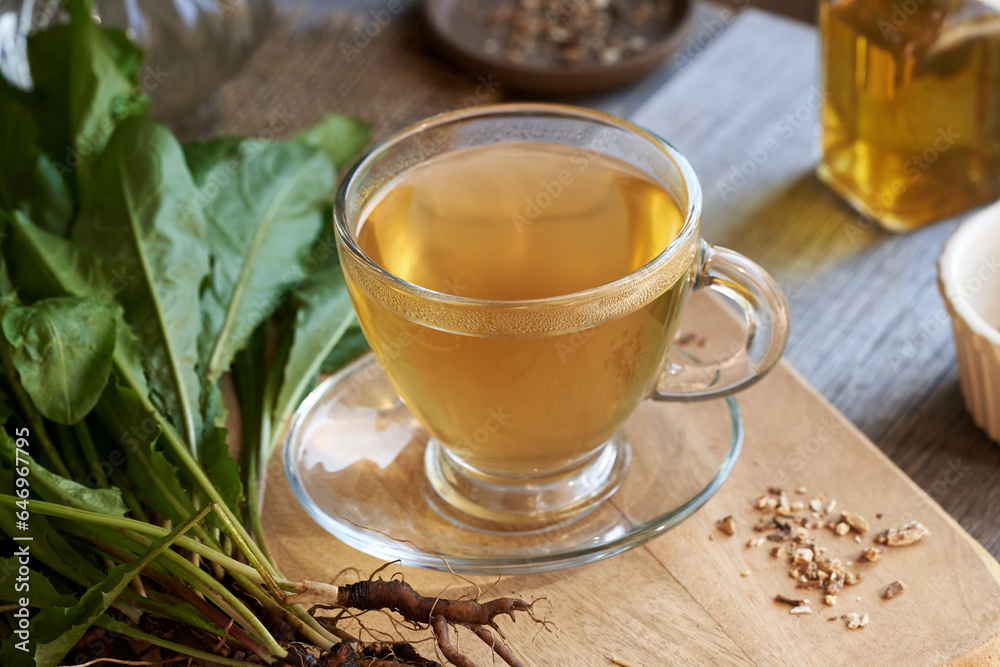 A cup of dandelion root tea on a table A cup of dandelion root tea on a table