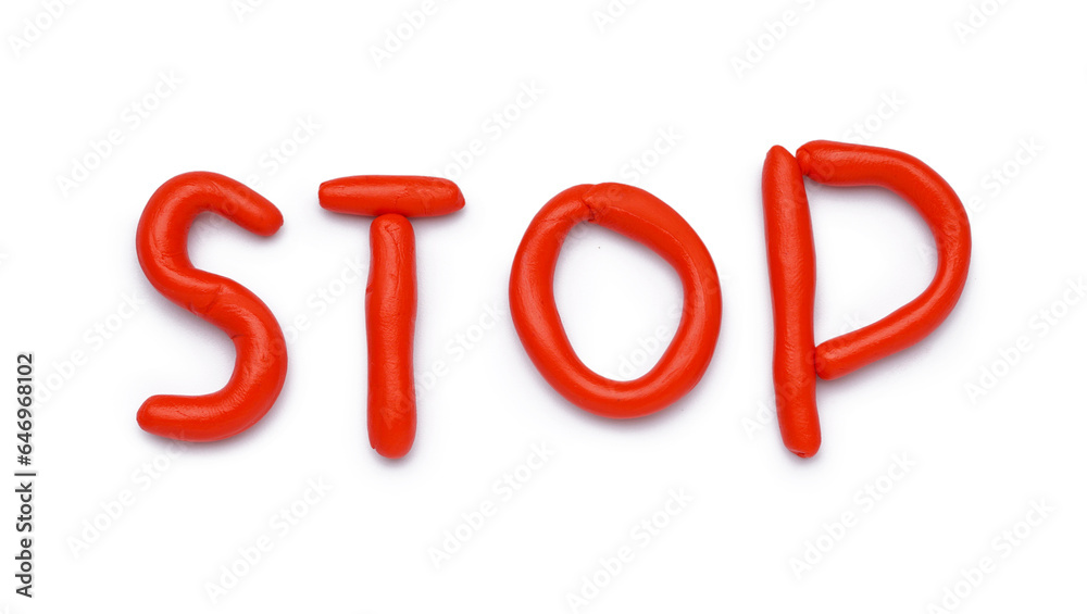 Red word STOP made of play dough on white background Red word STOP made of play dough on white background