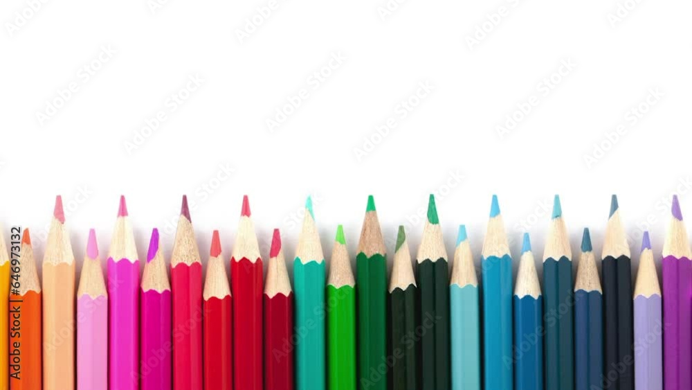 Movement of colored pencils on a white background.