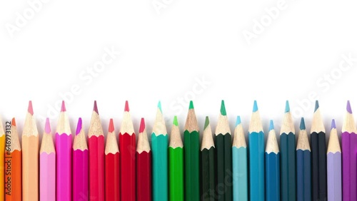 Movement of colored pencils on a white background.