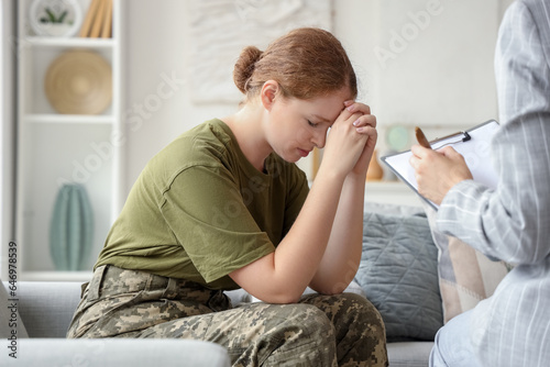 Sad female soldier in psych...