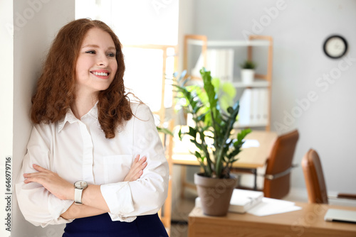 Smiling young businesswoman...