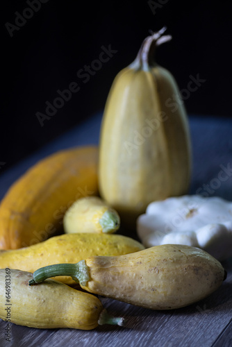Various types of fresh summer squash.