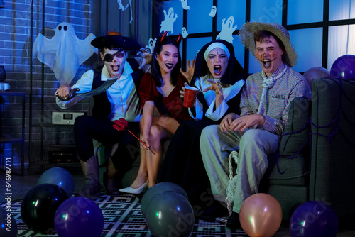Friends in halloween costum...