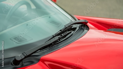 Windshield wipers on a red car photo