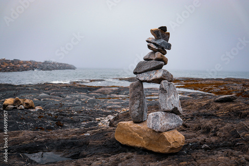 inukshuk on the beach photo