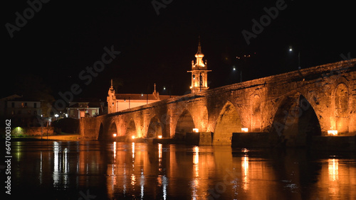 Bridge crossing the Rio Lima at night