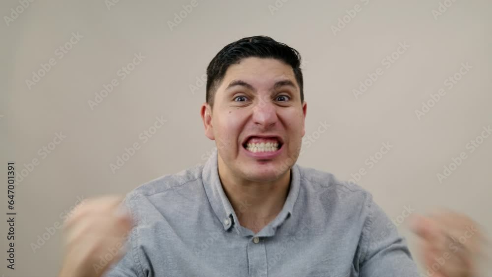 Irritated middle-aged Hispanic man shouting, cursing, waving his hands in anger. Hispanic man overwhelmed with negative emotions shouting at camera. High quality 4k footage Irritated middle-aged Hispanic man shouting, cursing, waving his hands in anger. Hispanic man overwhelmed with negative emotions shouting at camera. High quality 4k footage