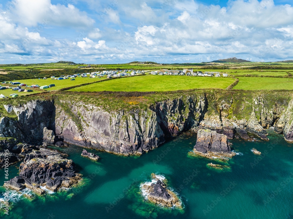 Cliffs and Fields over Porthclais from a drone, St Davids, Haverfordwest, Wales, England