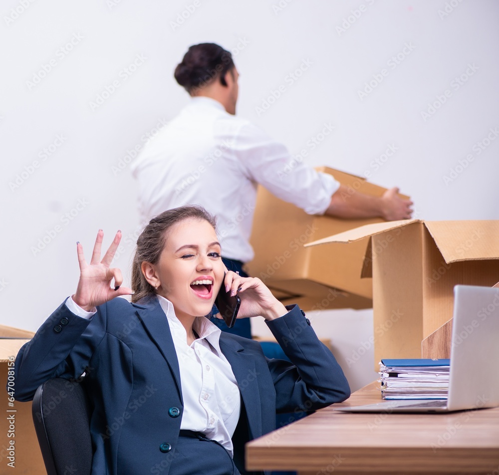 Two employees being fired from their work Two employees being fired from their work