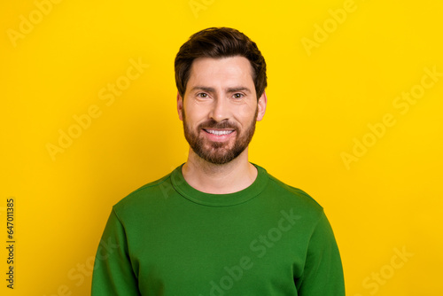 Portrait of nice bearded businessman guy white toothy smile good mood wearing green sweatshirt isolated yellow color background