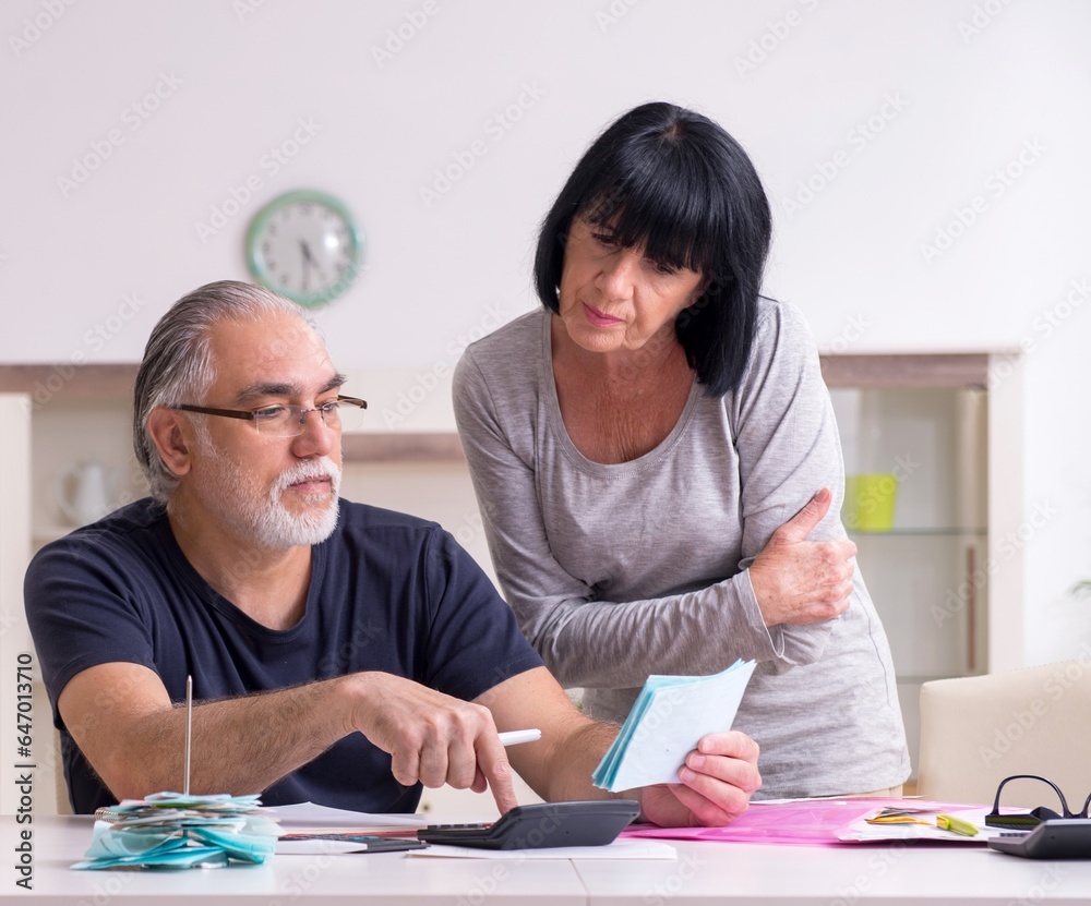 Senior couple discussing financial plans Senior couple discussing financial plans