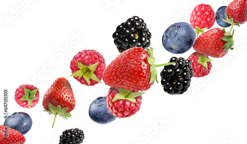 Many different berries flying on white background