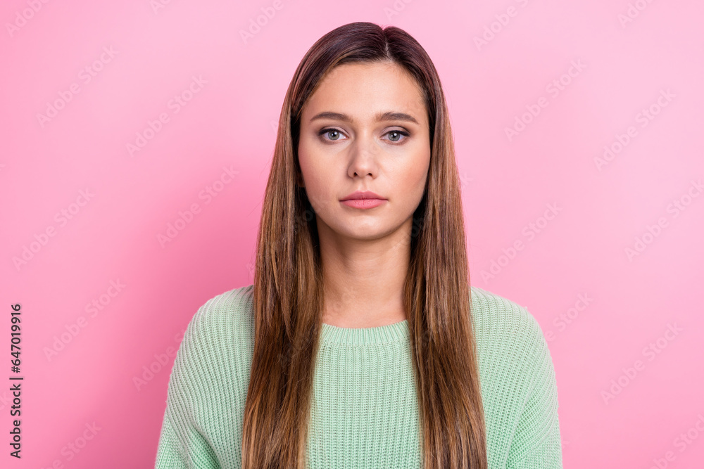 Portrait photo of cute young girl confident serious face wearing green stylish sweater cute face lady isolated over pink color background Portrait photo of cute young girl confident serious face wearing green stylish sweater cute face lady isolated over pink color background