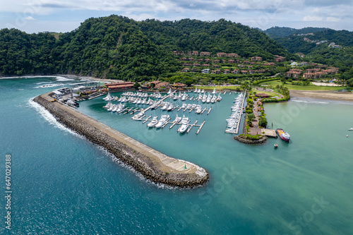 Beautiful aerial view of the Los Sueños Marina full with yachts and boats in Herradura Beach - Costa Rica