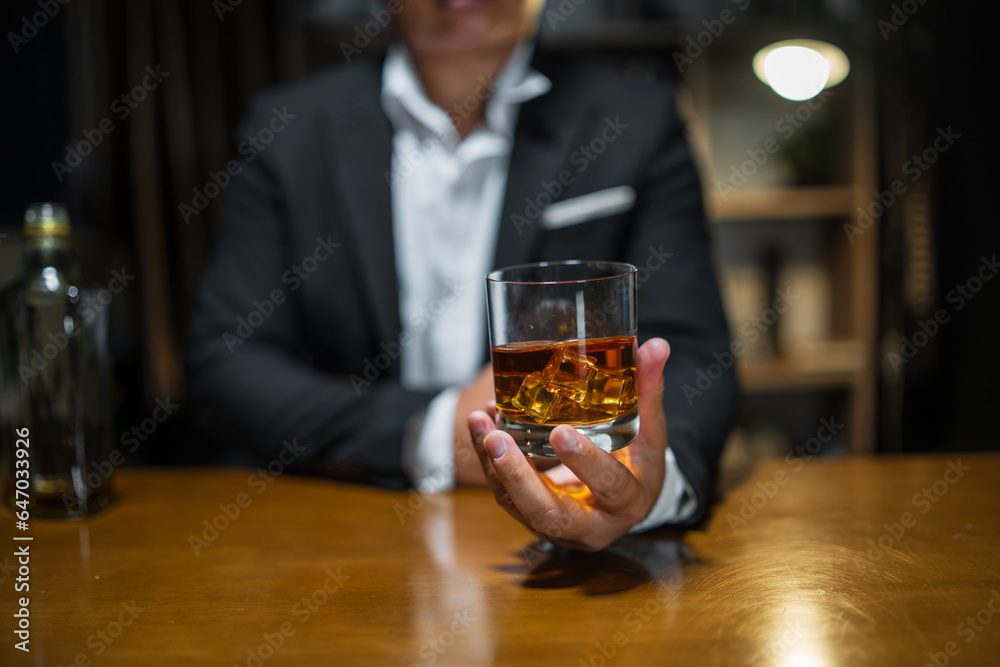 Businessmen in suits drinking  Celebrate whiskey.