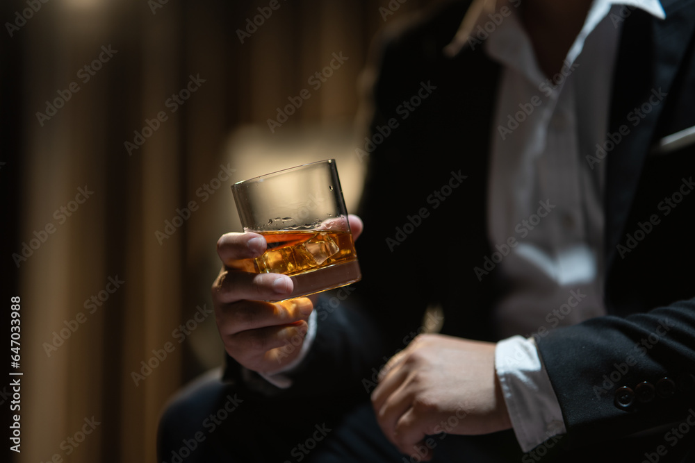 Businessmen in suits drinking  Celebrate whiskey.