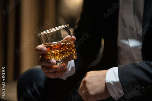 Businessmen in suits drinking  Celebrate whiskey.