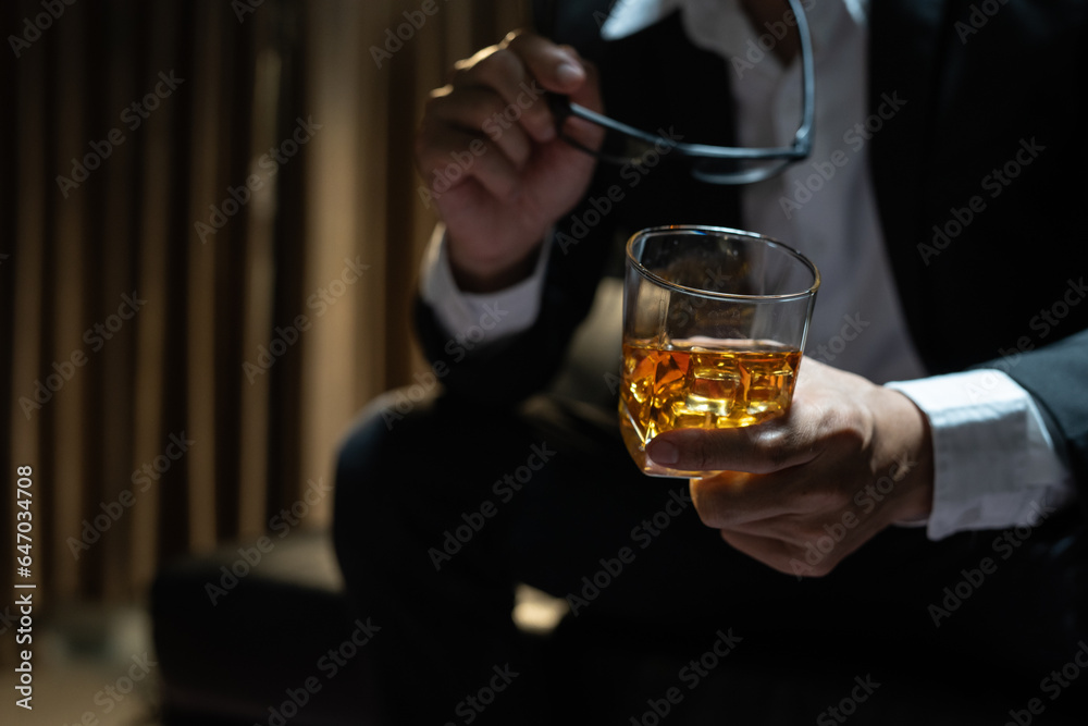 Businessmen in suits drinking  Celebrate whiskey.