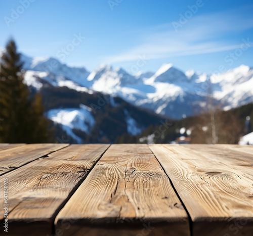 The empty wooden table top with blur background of Alpine with snow capped. Exuberant image. Made with generative ai © Farid