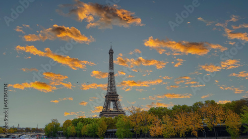 Banner of travel in Paris with Eiffel Tower iconic Paris landmark across the River Seine with tourist boat in Autumn tree fall scene at Paris ,France