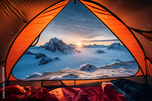 POV from a camping tent: scenic view of the snowy mountains in the winter.
